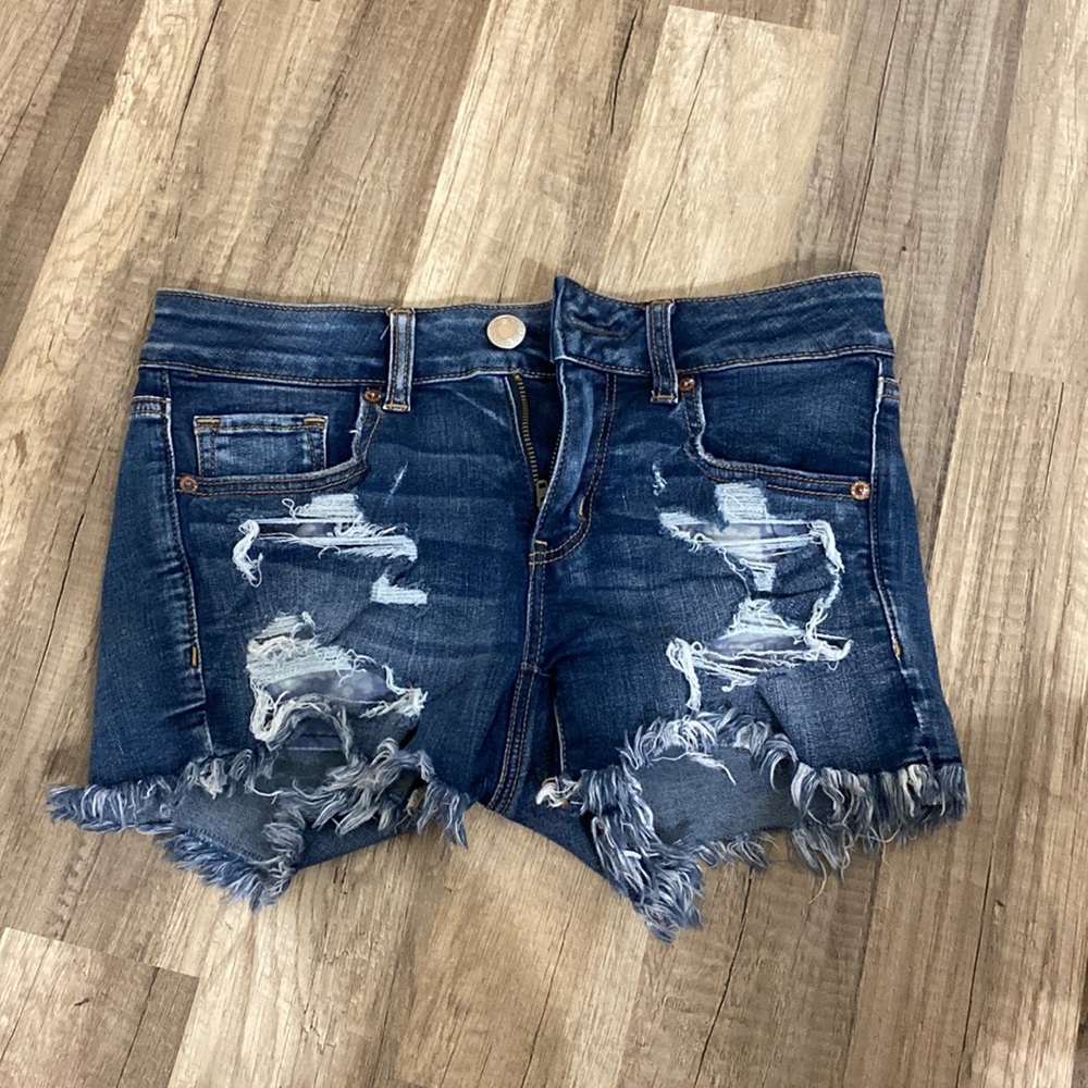 American Eagle distressed mid rise shorts size 4
